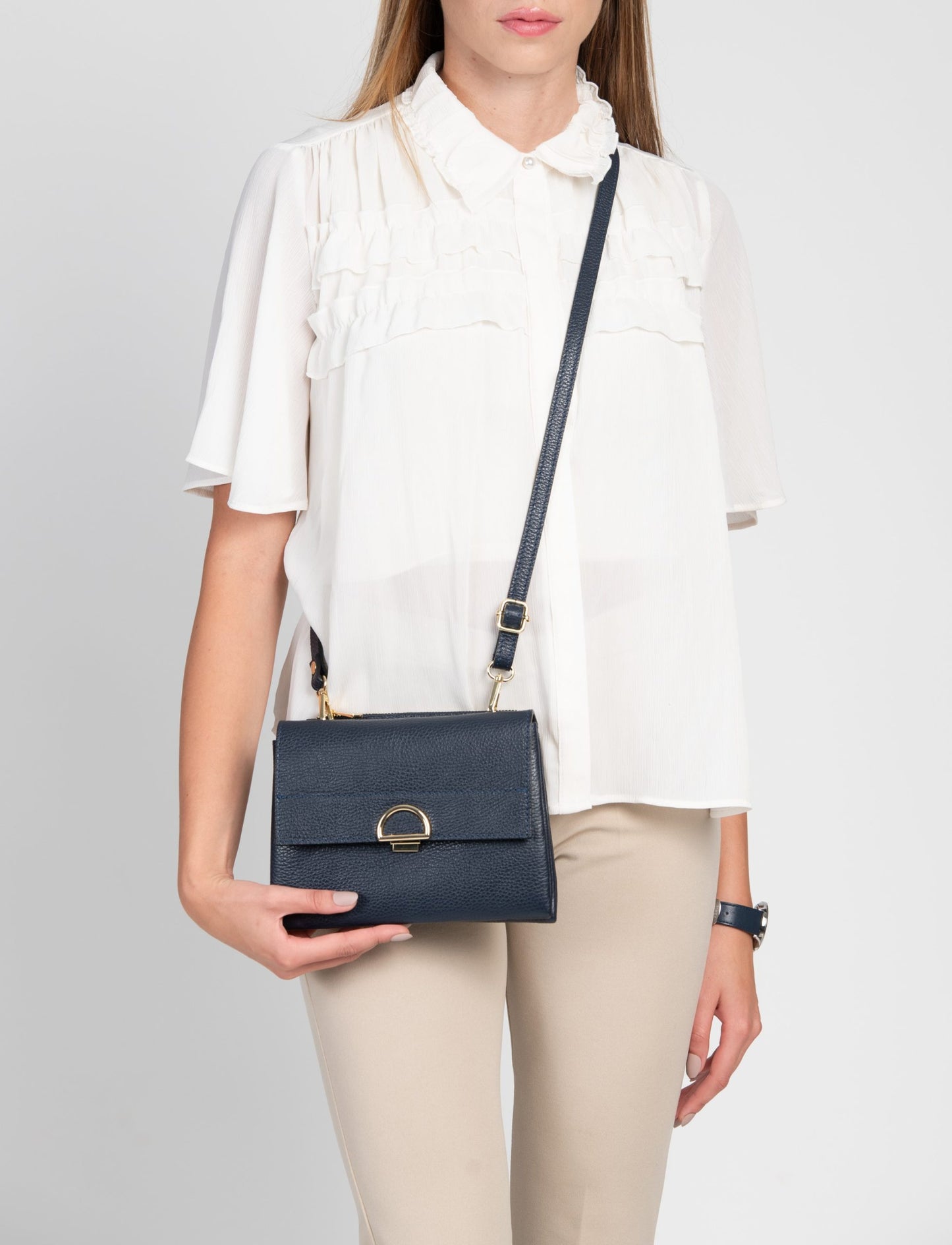 Sabrina Navy Crossbody Italian Leather Handbag from LA LUPA / Model wears bag across body